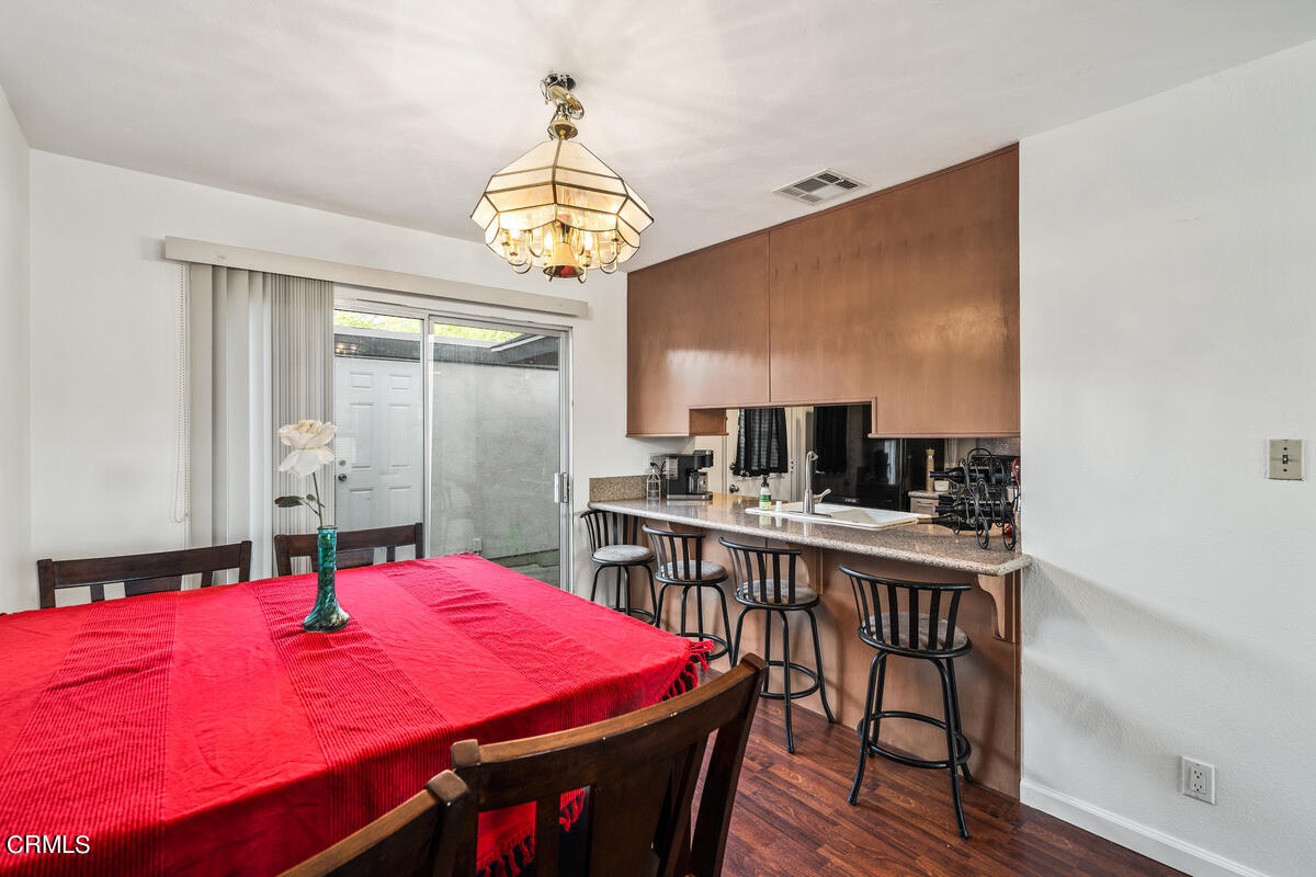 2117 Miramar Walk Oxnard, CA 93035 - Photo 5 of 30 a view of a dining room with furniture