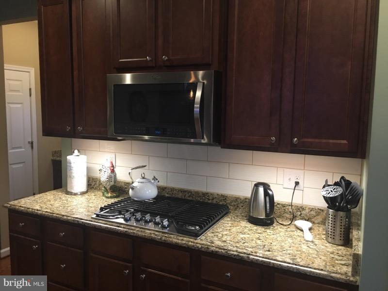 653 Claiborne Road North East, MD 21901 - Photo 5 of 27 ALL counters tops throughout are granite