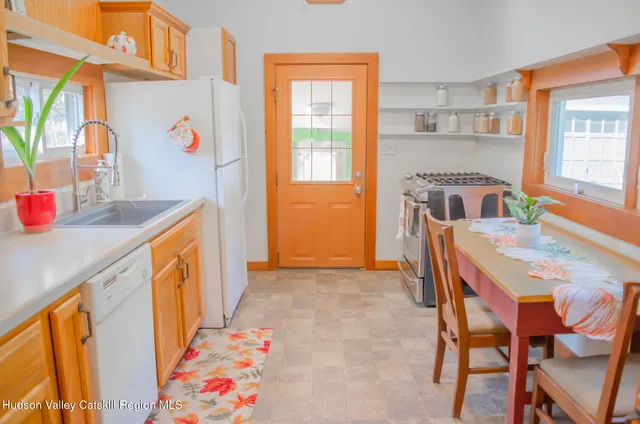 a view of a kitchen area with furniture and window