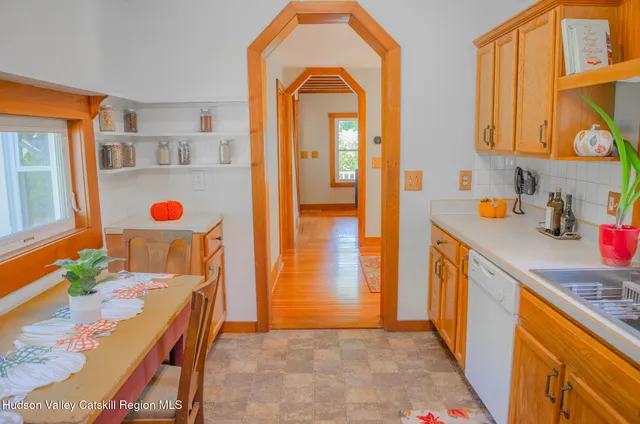 a view of a dining room with furniture window and outside view