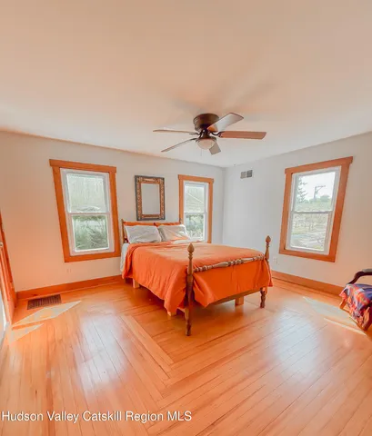 a bathroom with a sink a mirror and a bathtub