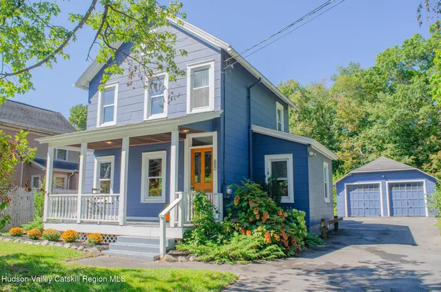 an aerial view of a house with a garden