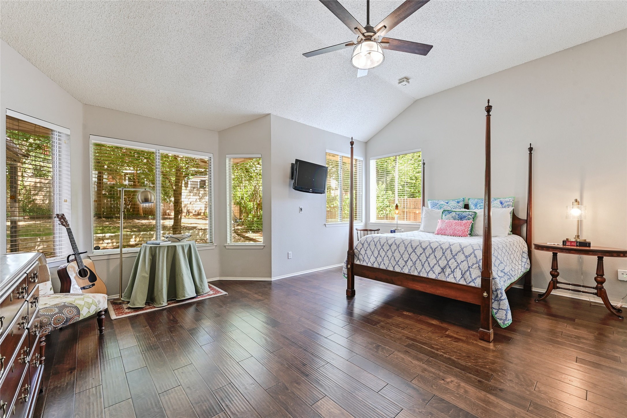 10906 Redgate Lane Austin, TX 78739 - Photo 12 of 25 Primary bedroom with hardwoood floors