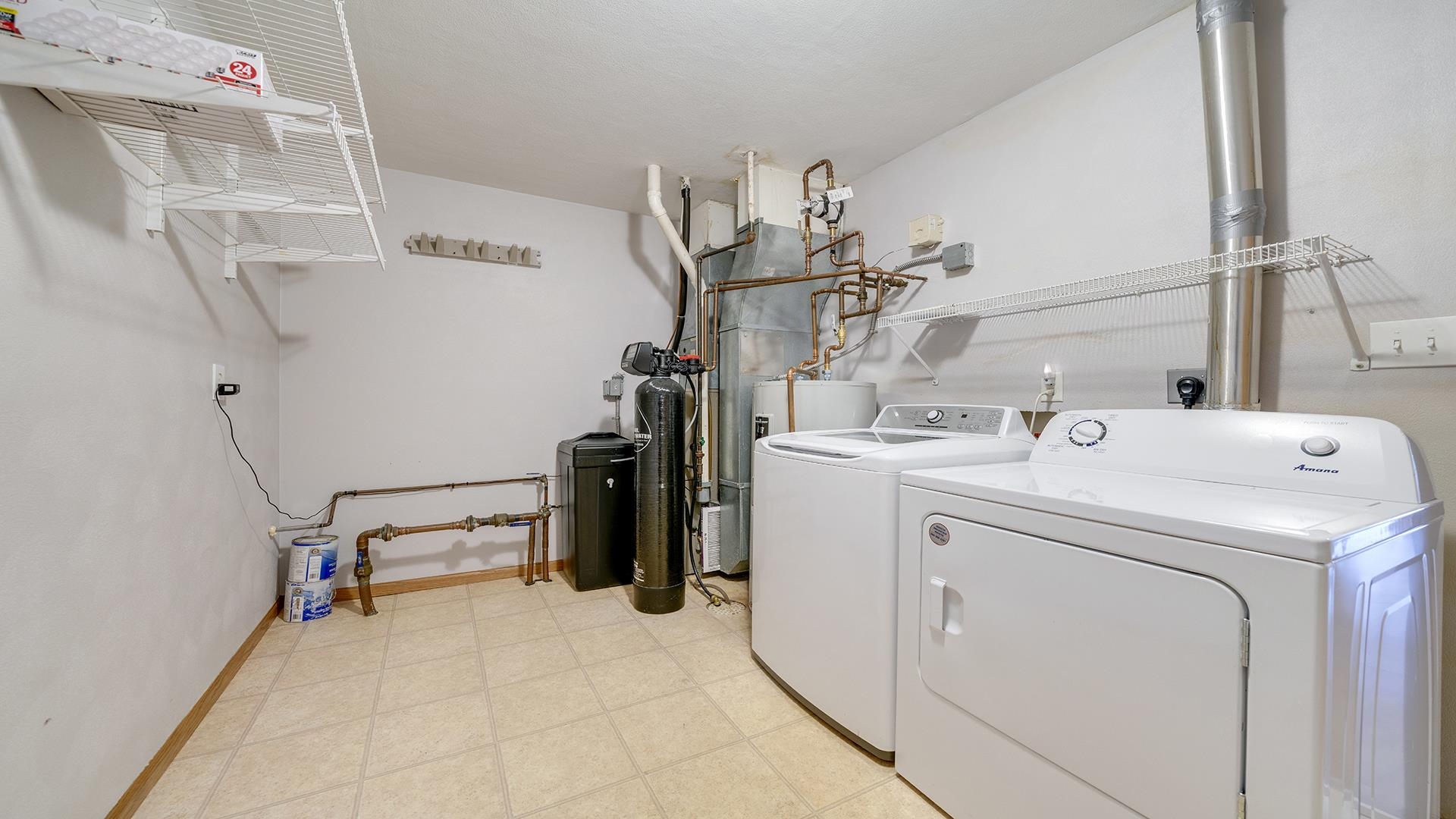 443 Mill Ridge Drive Byron, IL 61010 - Photo 12 of 25 a utility room with dryer and washer