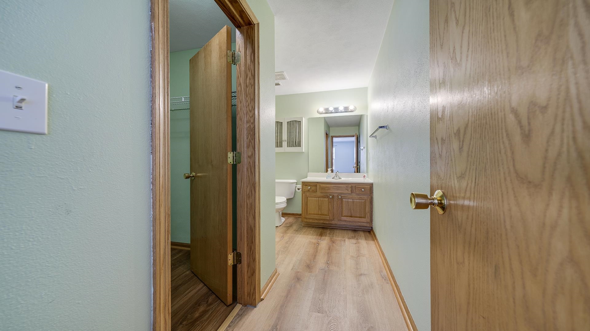 443 Mill Ridge Drive Byron, IL 61010 - Photo 15 of 25 a bathroom with a sink and mirror