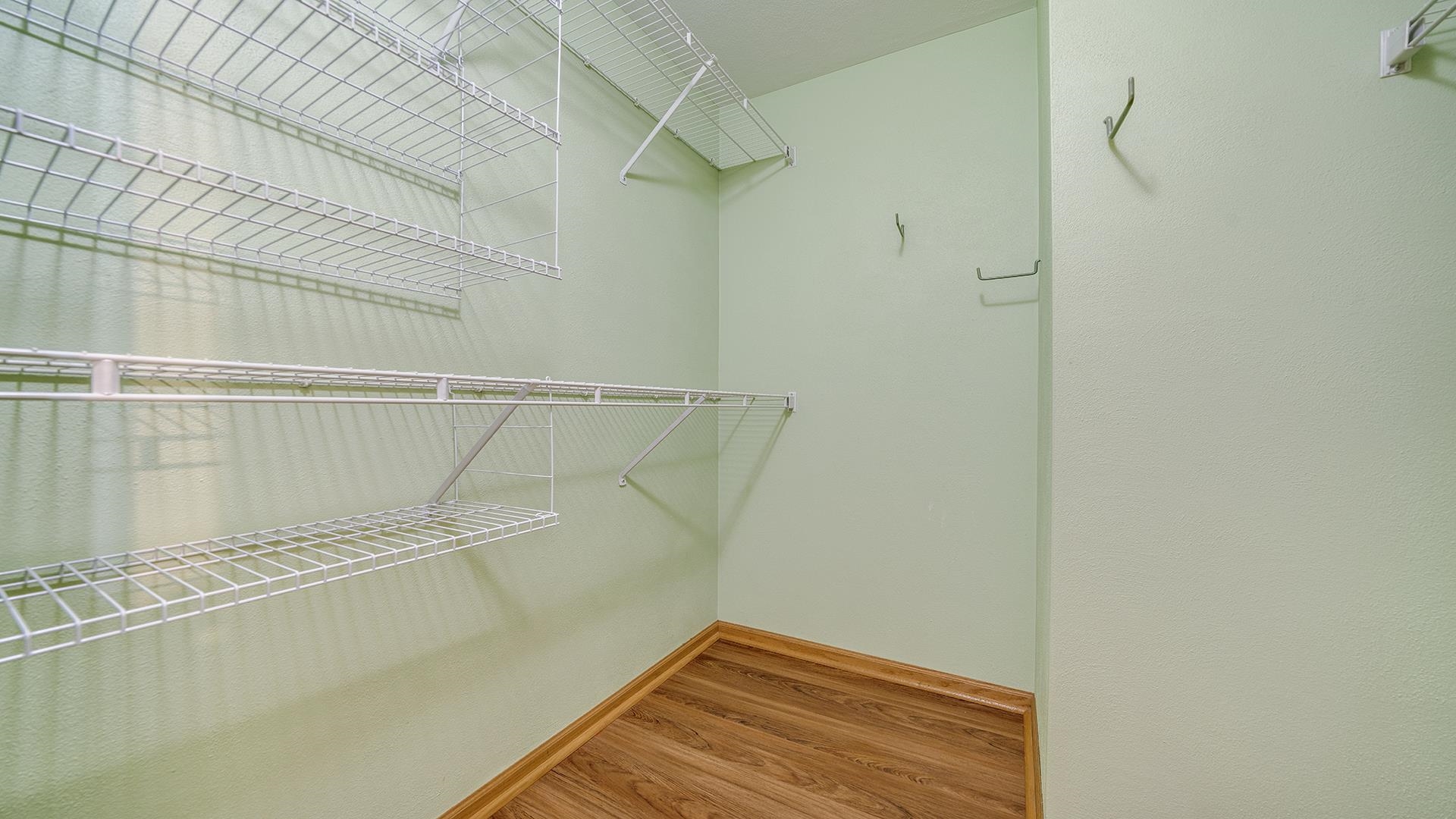 443 Mill Ridge Drive Byron, IL 61010 - Photo 16 of 25 a view of a room with racks on the wall