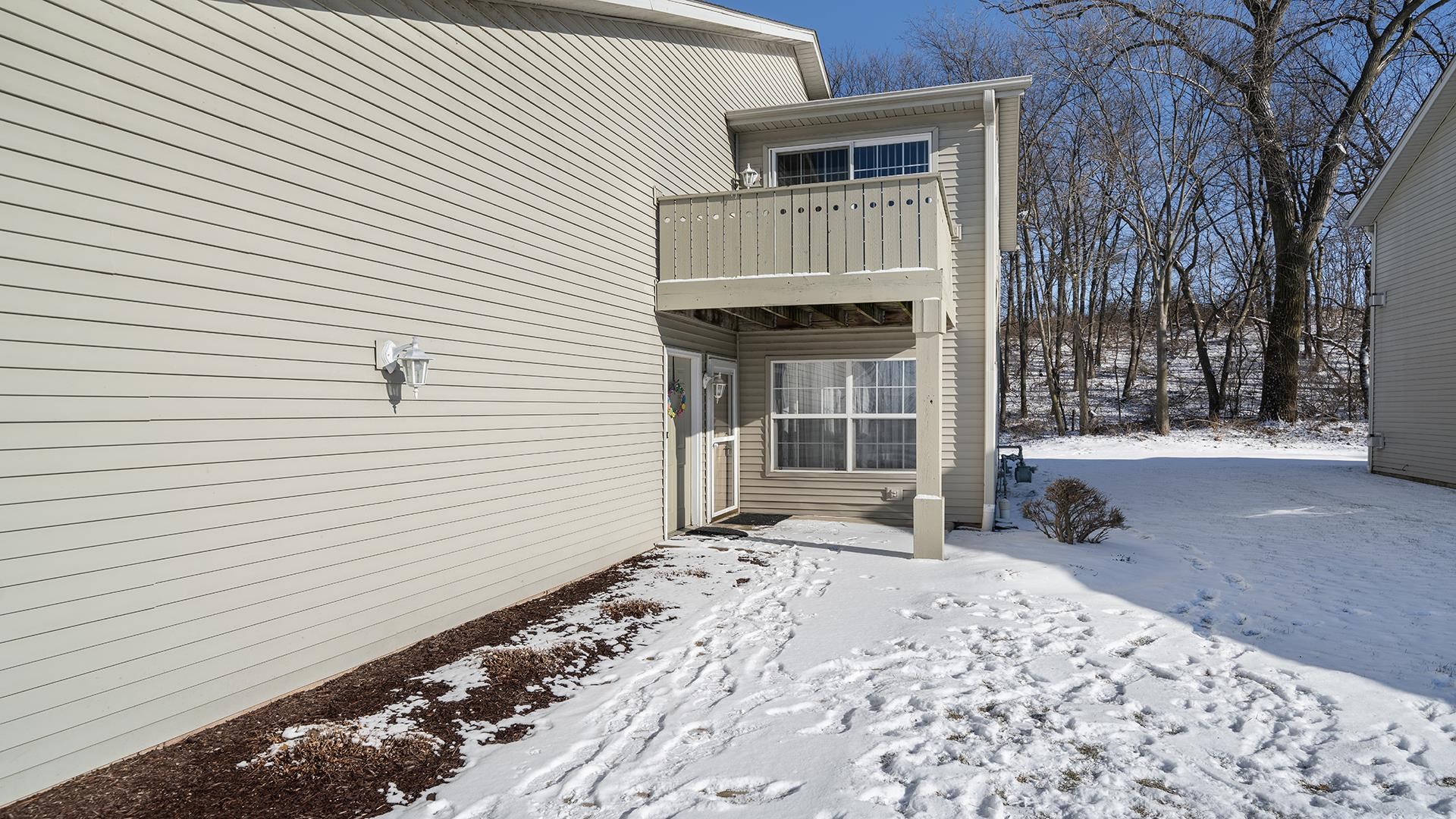 443 Mill Ridge Drive Byron, IL 61010 - Photo 24 of 25 a view of a house with a snow on the road