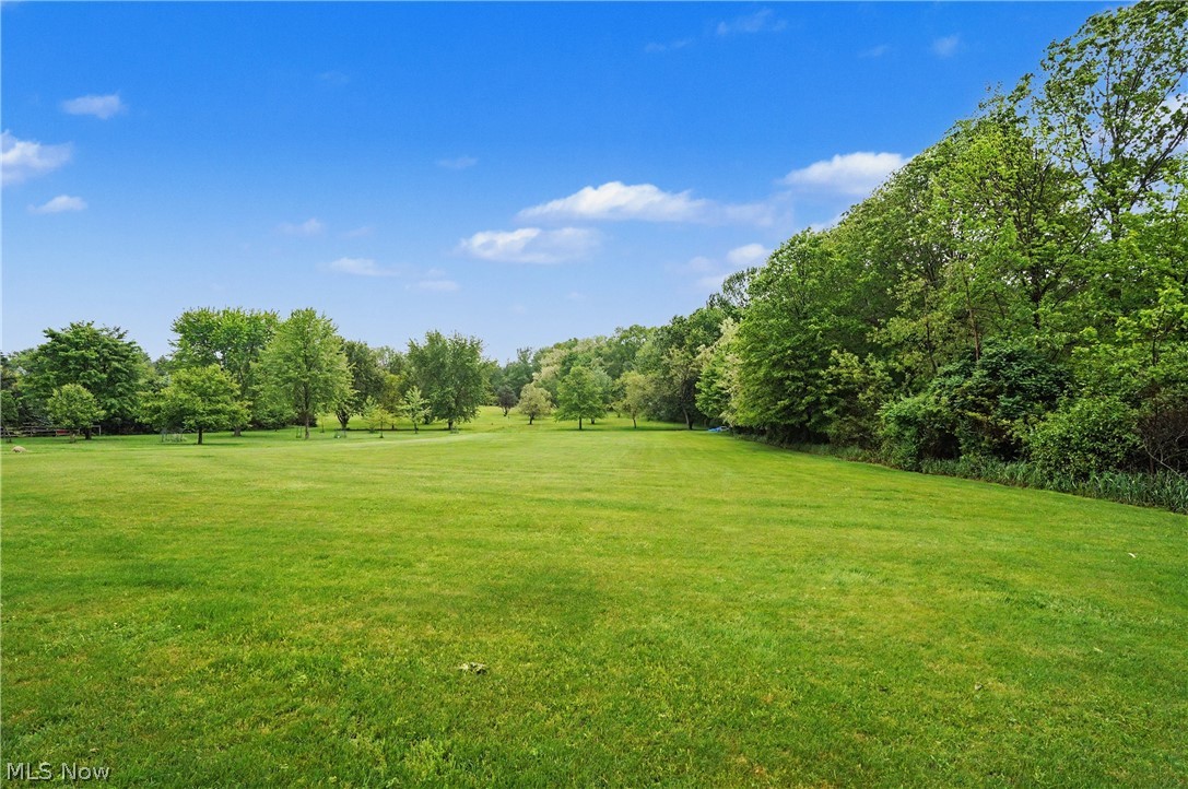 992 Martin Road Mogadore, OH 44260 - Photo 6 of 50 992 Martin Rd, Mogadore, OH 44260 offers the ideal blend of peaceful country living, functional space, and everyday comfort, all nestled on a beautiful tree lined setting on over 2 acres in Suffield Township of Portage County with easy access to Rt 224.