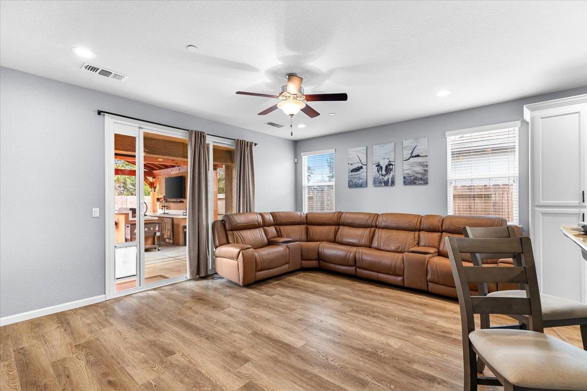 6617 Cervi Road Riverbank, CA 95367 - Photo 20 of 51 a living room with furniture and a large window