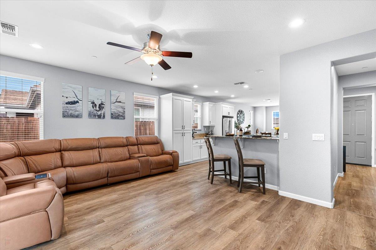 6617 Cervi Road Riverbank, CA 95367 - Photo 21 of 51 a living room with furniture and kitchen view