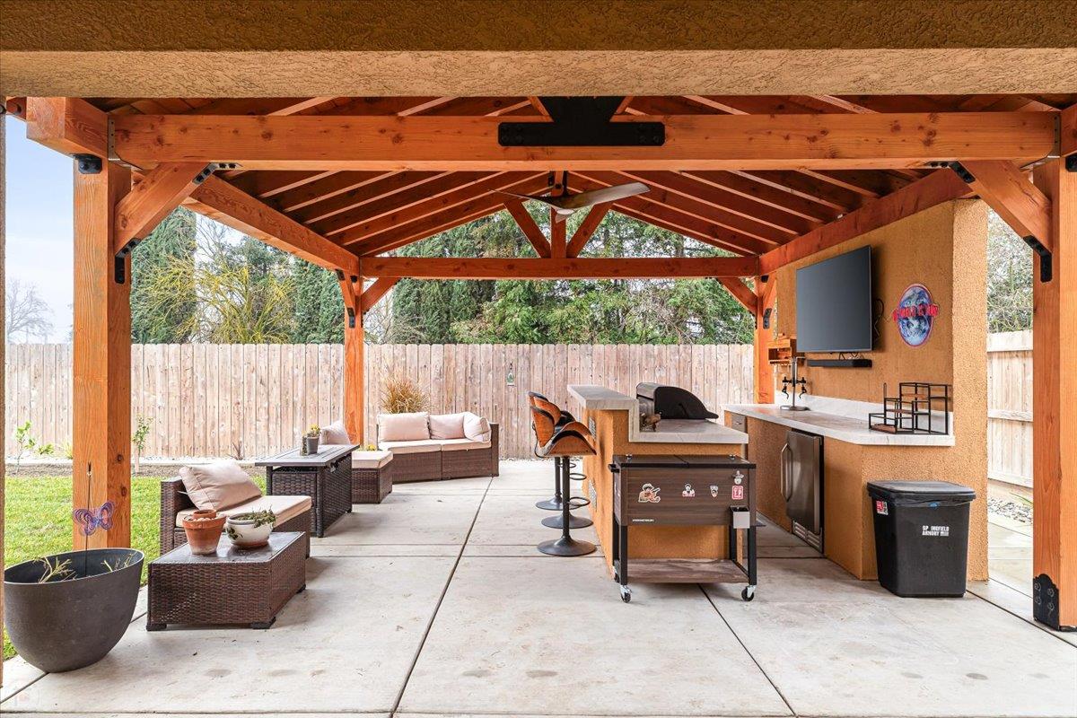 6617 Cervi Road Riverbank, CA 95367 - Photo 37 of 51 a patio with a table and chairs