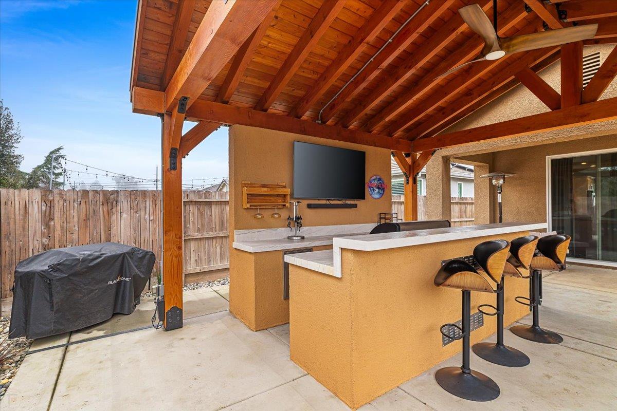 6617 Cervi Road Riverbank, CA 95367 - Photo 41 of 51 a view of swimming pool with furniture and floor to ceiling window