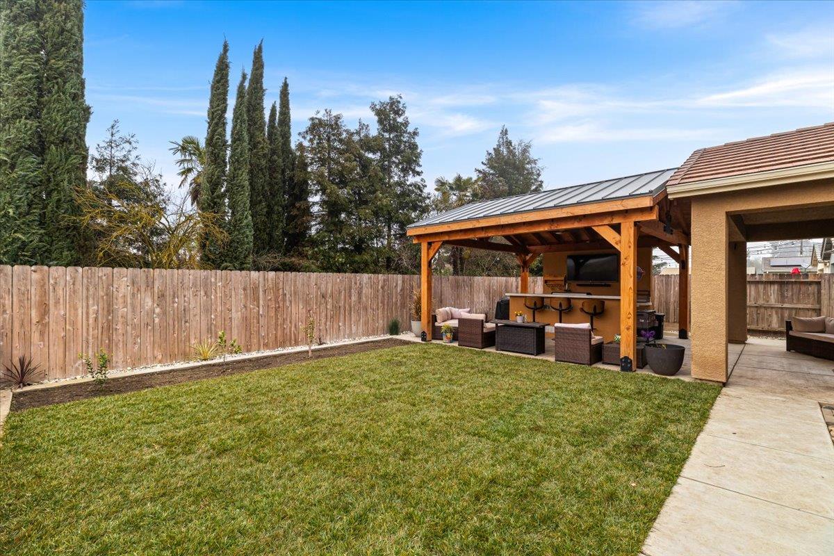 6617 Cervi Road Riverbank, CA 95367 - Photo 49 of 51 a view of a car park in front of house