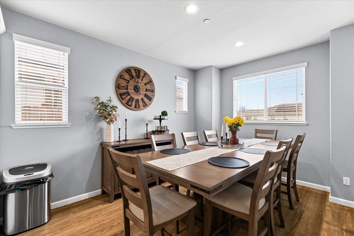 6617 Cervi Road Riverbank, CA 95367 - Photo 8 of 51 a view of a dining room with furniture window and wooden floor