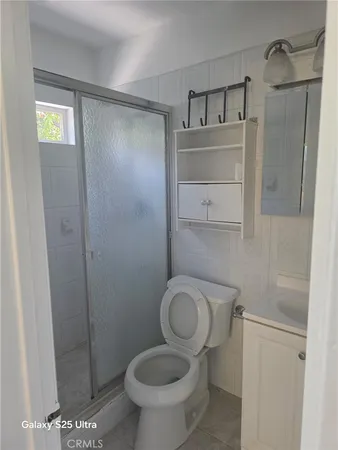 a bathroom with a toilet and a sink
