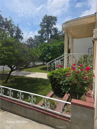 a view of house with outdoor space