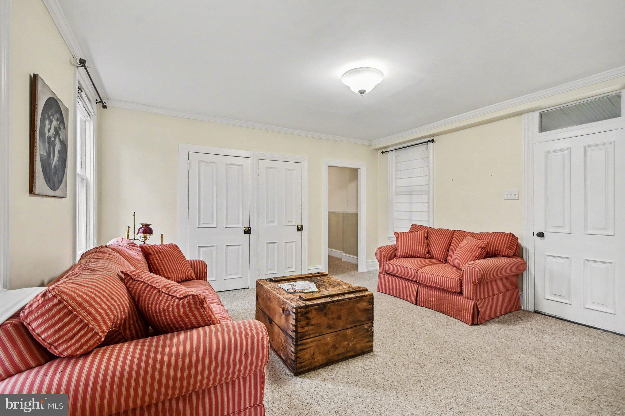 9627 Easton Road Upper Black Eddy, PA 18972 - Photo 13 of 28 a living room with furniture and a window