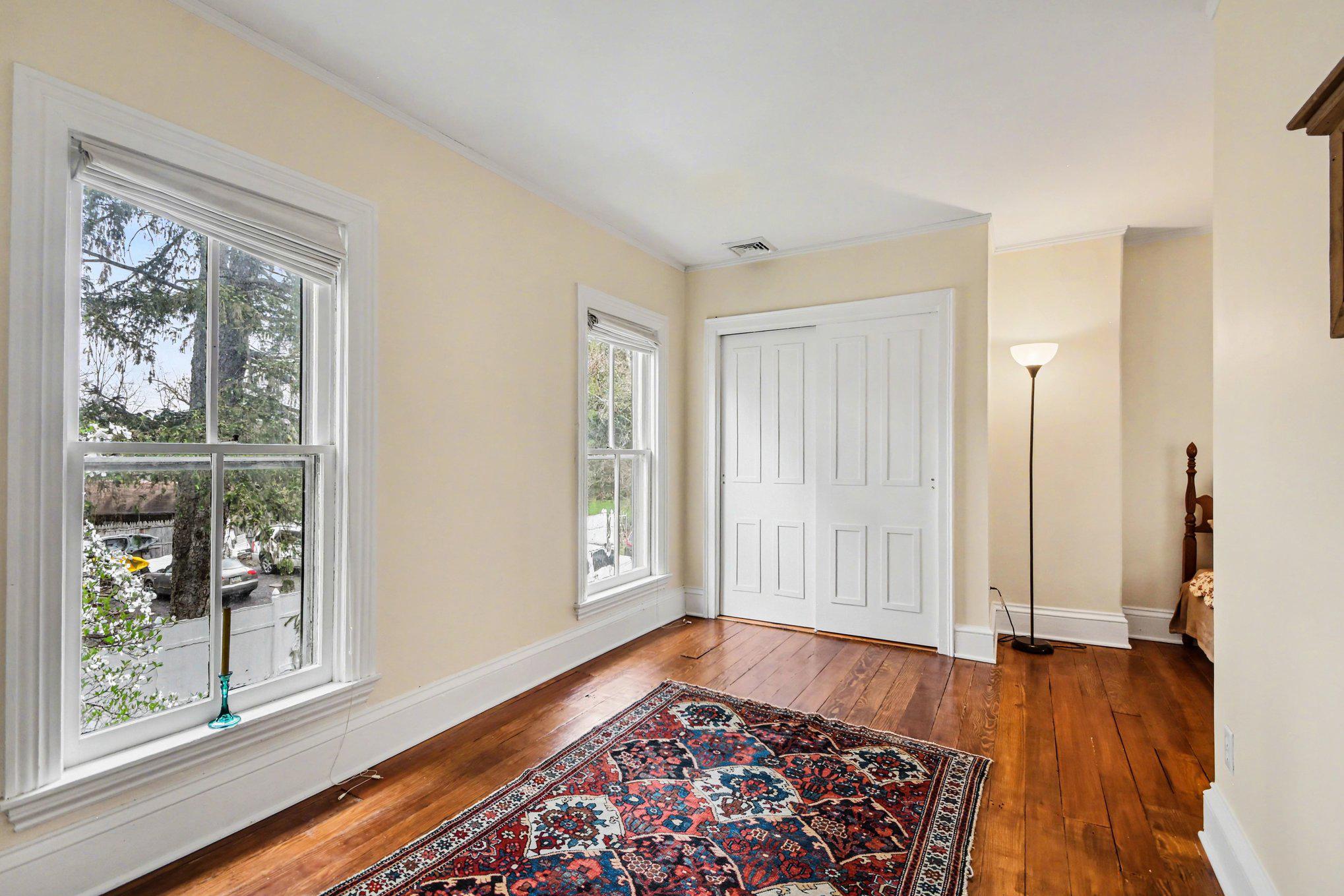 9627 Easton Road Upper Black Eddy, PA 18972 - Photo 7 of 28 a view of a room with wooden floor and window