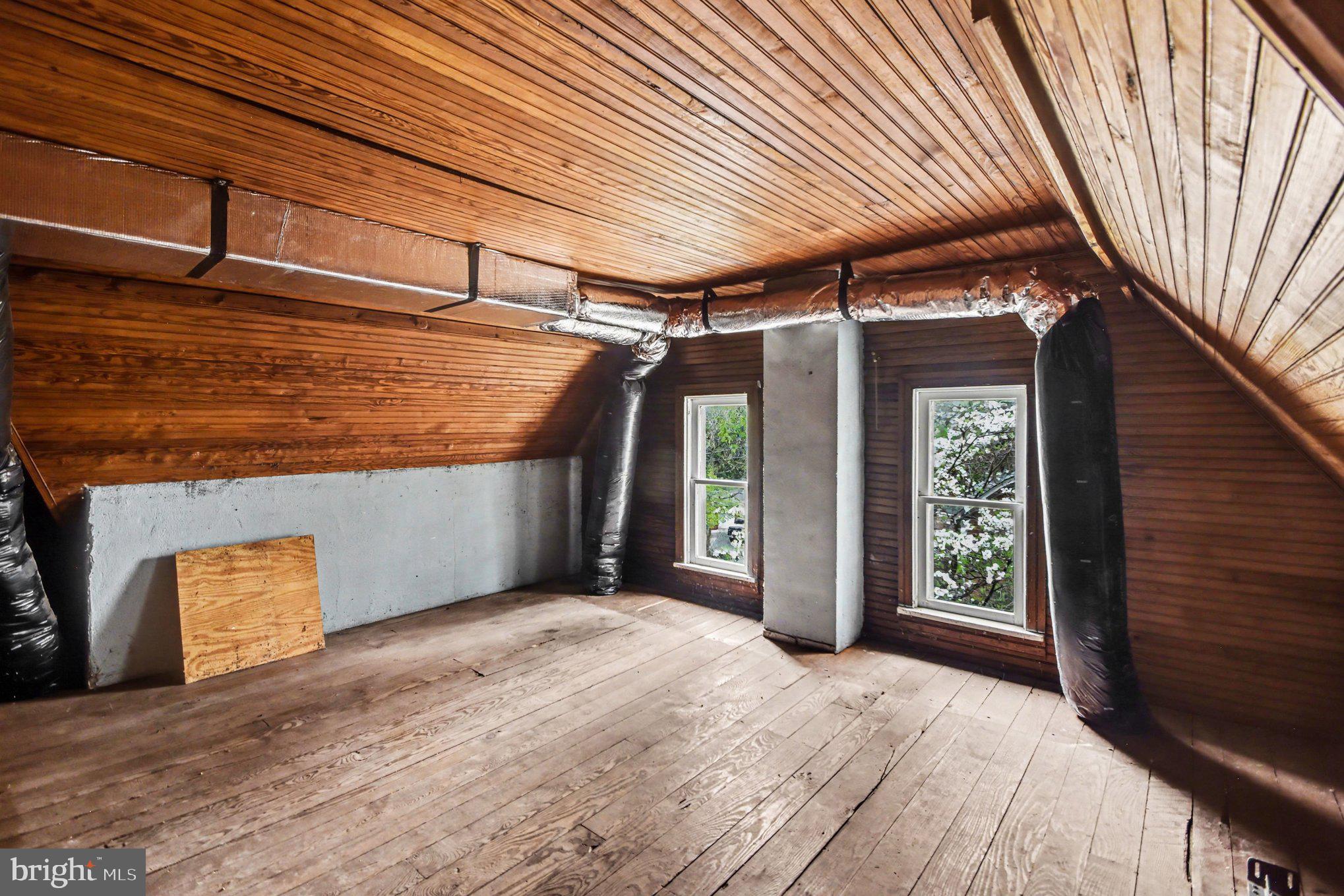 9627 Easton Road Upper Black Eddy, PA 18972 - Photo 9 of 28 a view of a room with wooden walls and roof