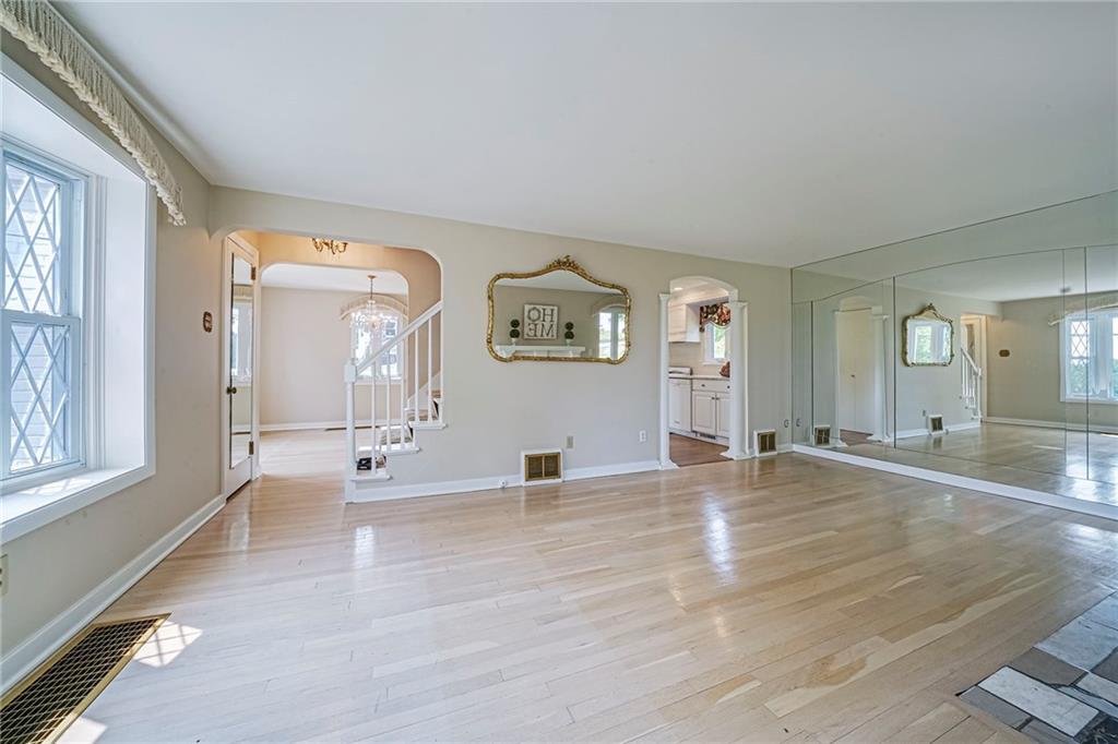 12 Kennedy Lane McKees Rocks, PA 15136 - Photo 11 of 29 a view of empty room with window and wooden floor