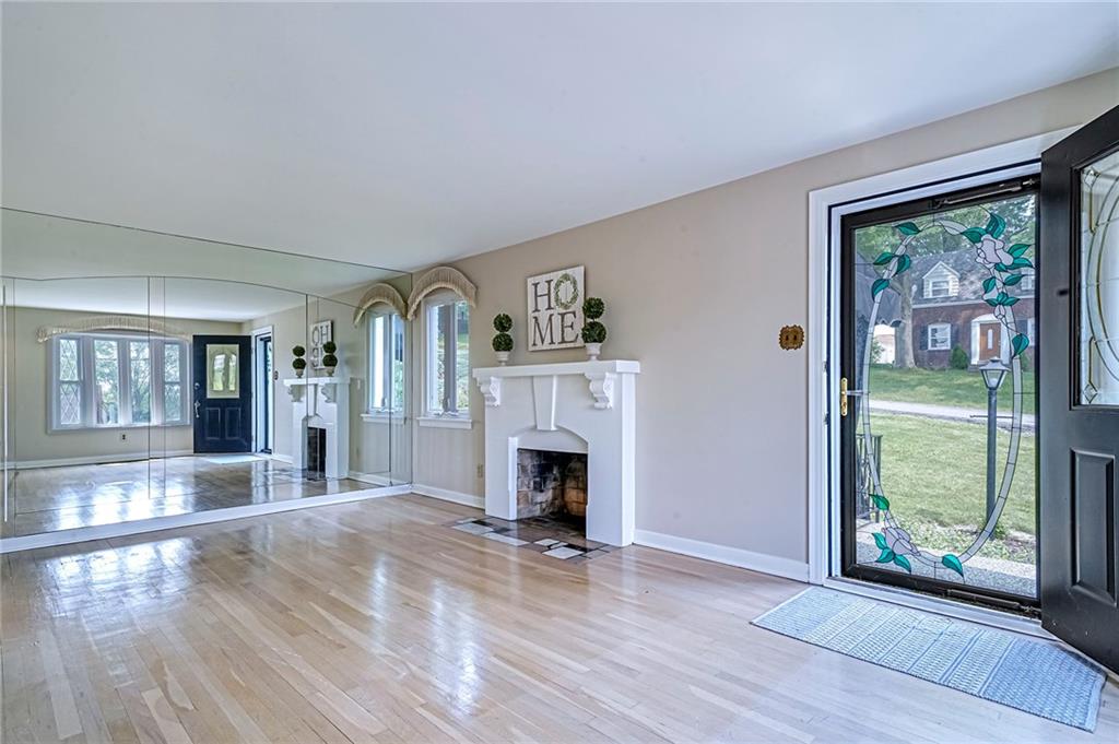 12 Kennedy Lane McKees Rocks, PA 15136 - Photo 12 of 29 a view of an empty room with wooden floor and a window