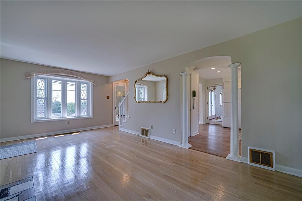12 Kennedy Lane McKees Rocks, PA 15136 - Photo 13 of 29 a view of empty room with wooden floor and fan