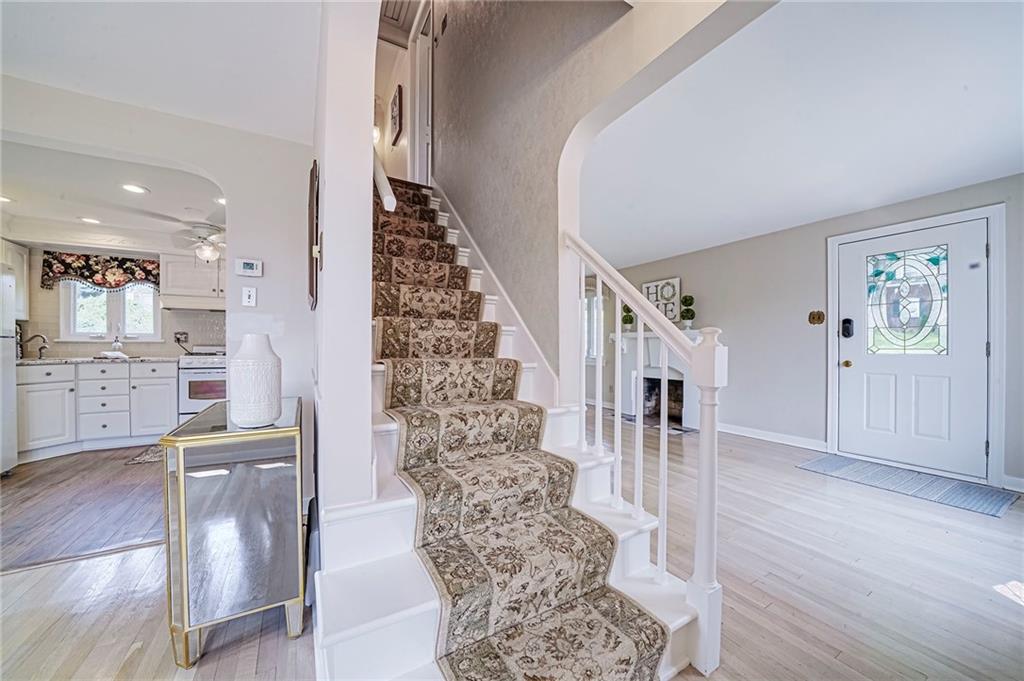12 Kennedy Lane McKees Rocks, PA 15136 - Photo 17 of 29 a view of entryway and hall with wooden floor