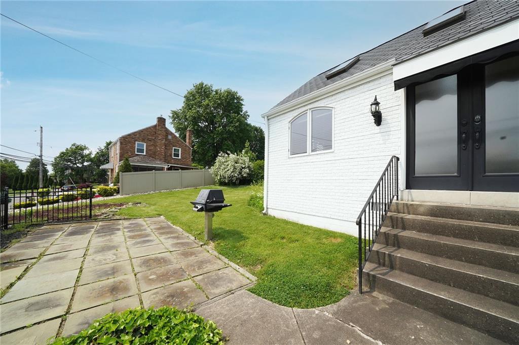 12 Kennedy Lane McKees Rocks, PA 15136 - Photo 24 of 29 a view of house with backyard space and garden
