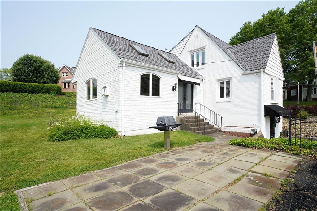 12 Kennedy Lane McKees Rocks, PA 15136 - Photo 25 of 29 a front view of a house with a yard