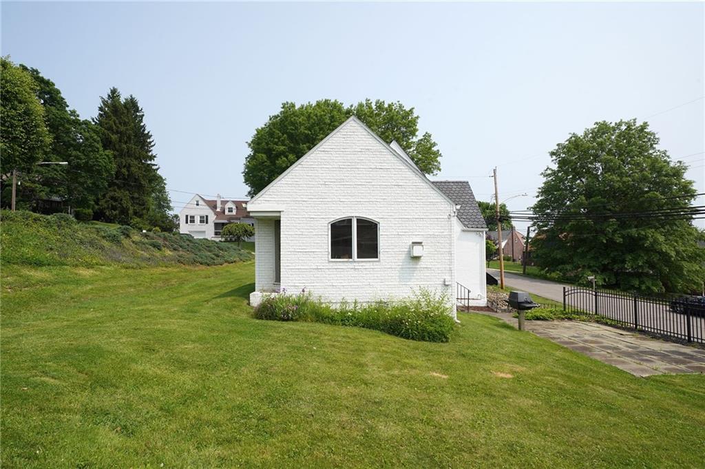 12 Kennedy Lane McKees Rocks, PA 15136 - Photo 27 of 29 a view of a house with a yard
