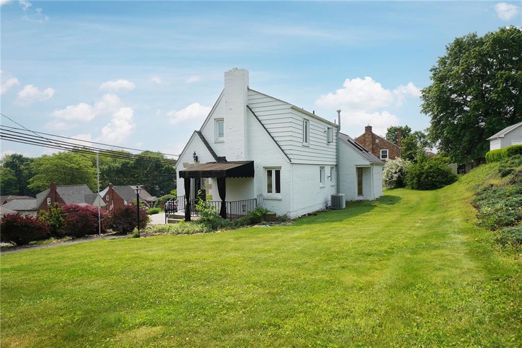 12 Kennedy Lane McKees Rocks, PA 15136 - Photo 28 of 29 a view of a house with a yard and sitting area