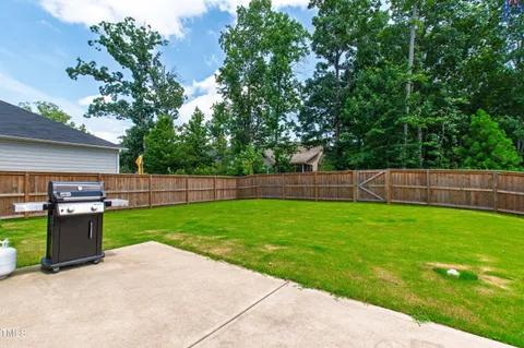 a view of a backyard with a garden
