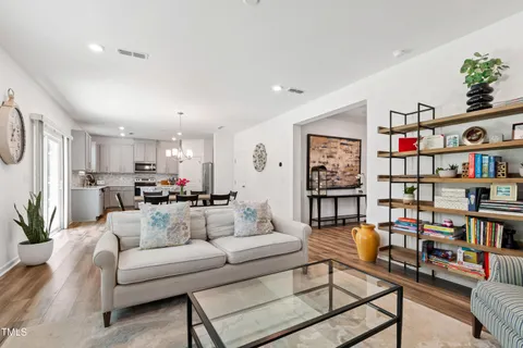 a view of entryway with wooden floor and stairs