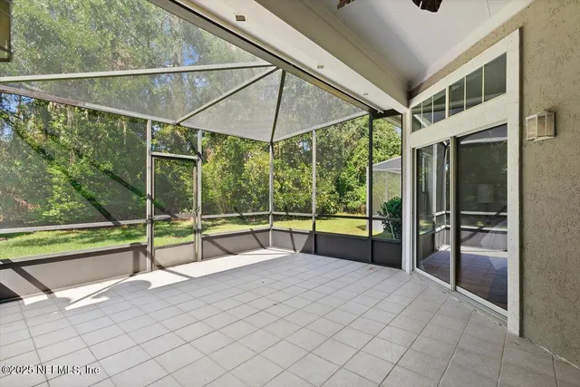 a view of a deck with a backyard