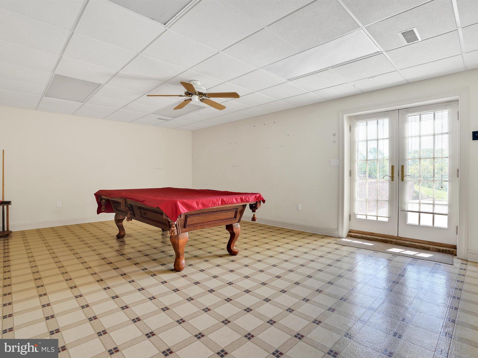 703 Norris Road Airville, PA 17302 - Photo 48 of 72 Billaird room with pool table, walk out to yard