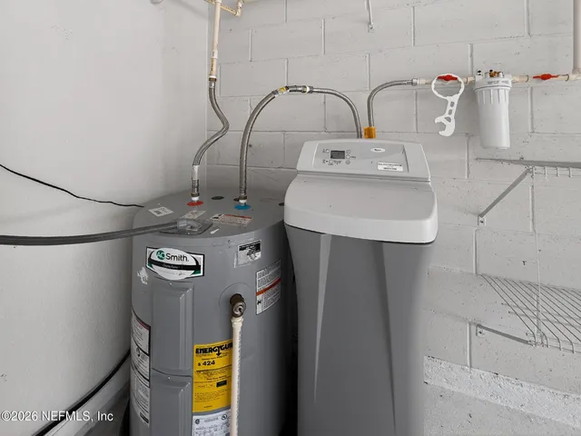 a view of balcony with wooden floor and fence