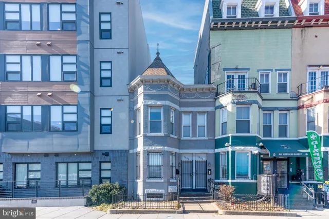 a front view of a building and a street