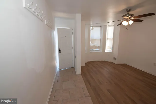 a view of livingroom with hardwood floor and window