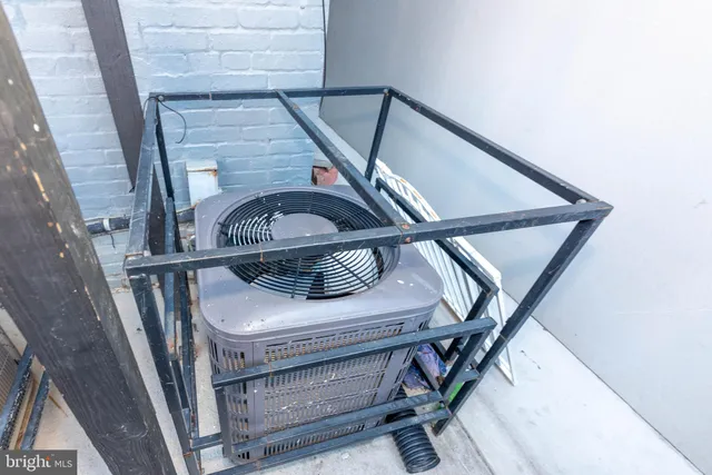 a outdoor space with lots of cars parked