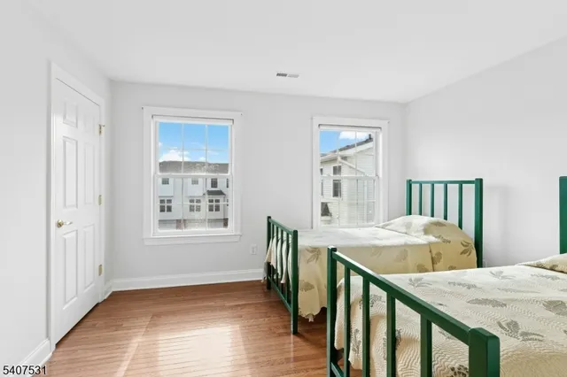a view of livingroom with furniture and wooden floor