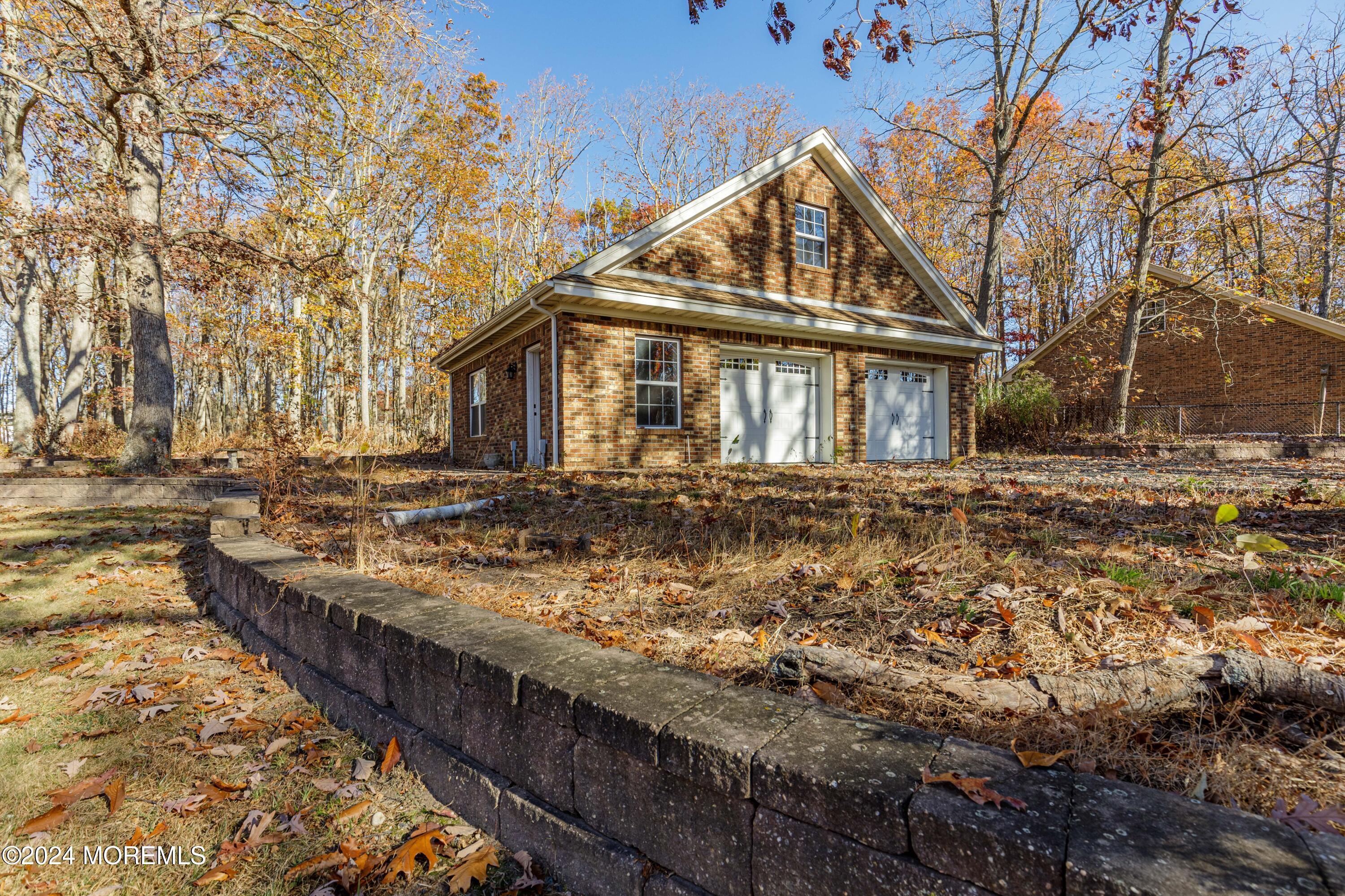 552 Hyson Road Jackson, NJ 08527 - Photo 18 of 23 a front view of a house with trees
