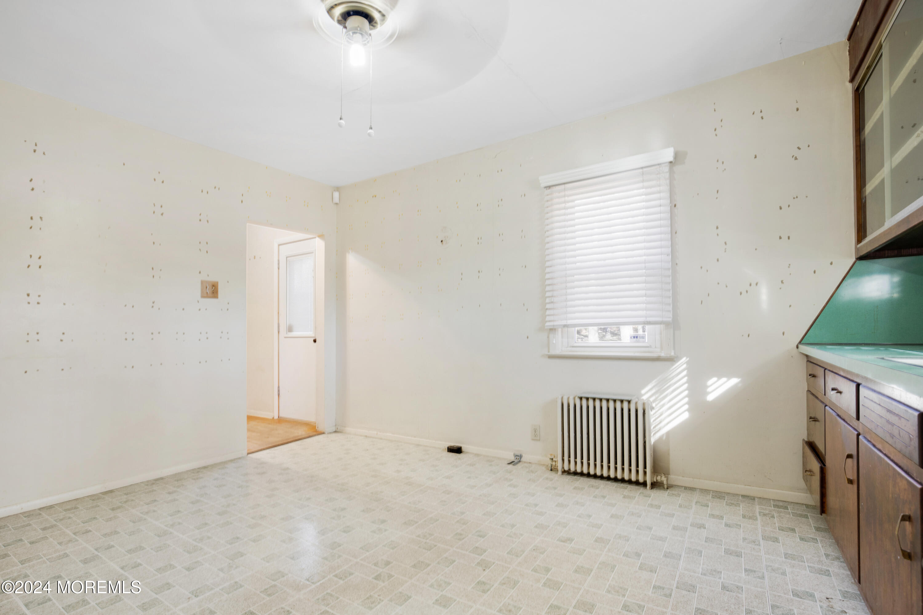 552 Hyson Road Jackson, NJ 08527 - Photo 6 of 23 a view of an empty room with a window