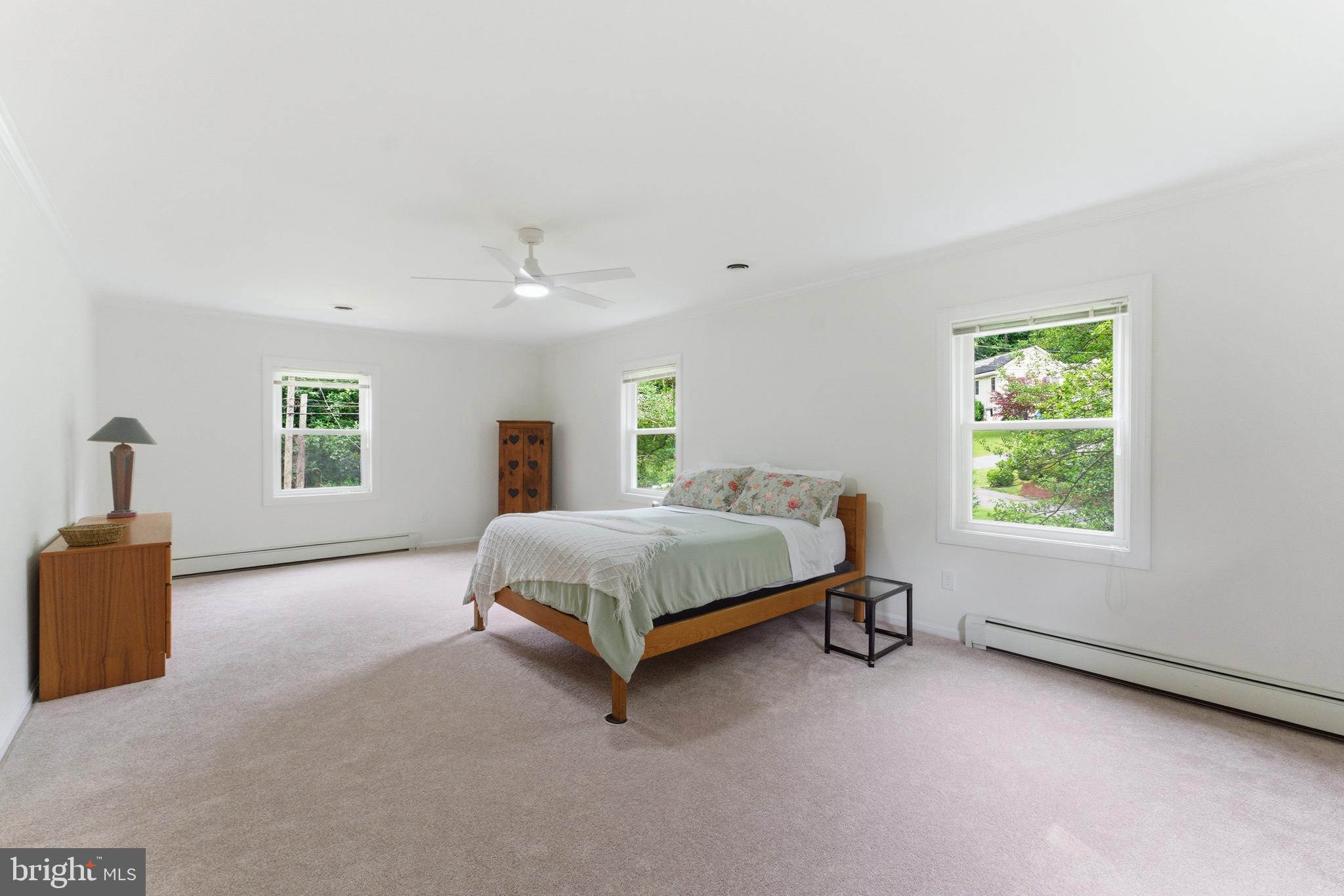 2100 Edgewater Parkway Silver Spring, MD 20903 - Photo 29 of 46 a bedroom with a bed and a window