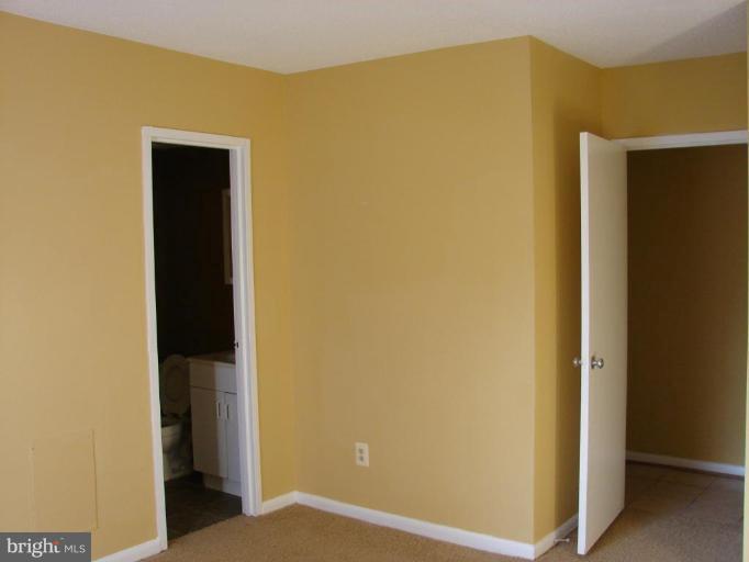 11627 Stoneview Square, Unit 78/11C Reston, VA 20191 - Photo 10 of 18 Master Bedroom