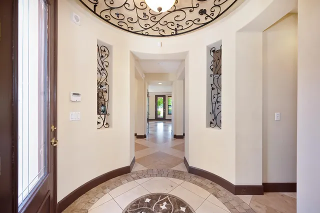a large kitchen with granite countertop a sink and counter space