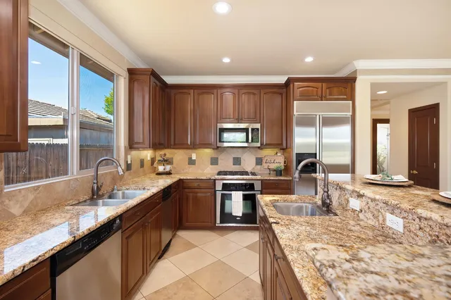 a bathroom with a glass shower door and a bathtub