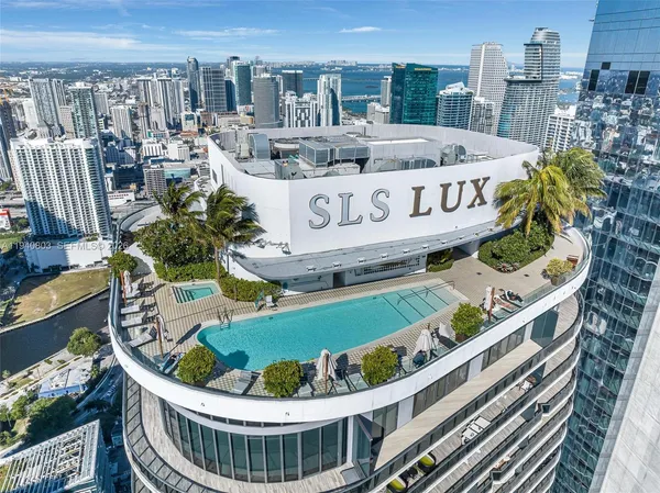 a view of a balcony with chairs