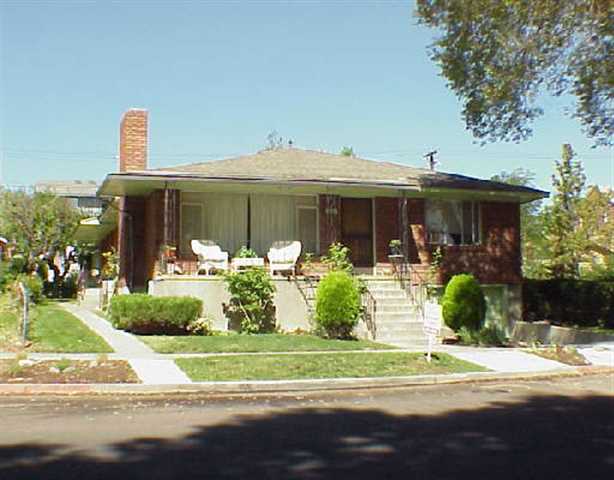 861 Forest Street Reno, NV 89509 - Photo 1 of 1 a front view of a house with garden