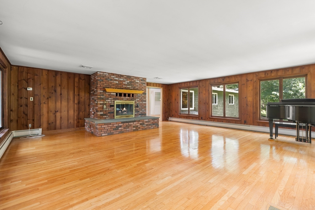 118 Echo Cove Road Hamilton, MA 01982 - Photo 11 of 40 a view of a livingroom with furniture hardwood floor and a window