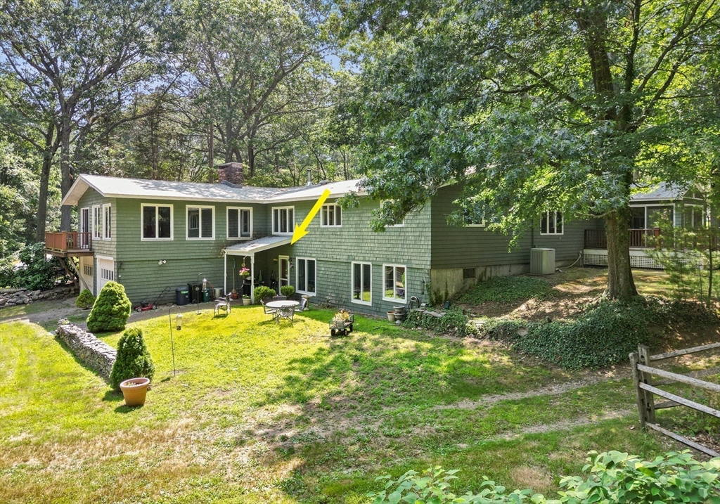 118 Echo Cove Road Hamilton, MA 01982 - Photo 36 of 40 front view of a house with a yard table and chairs